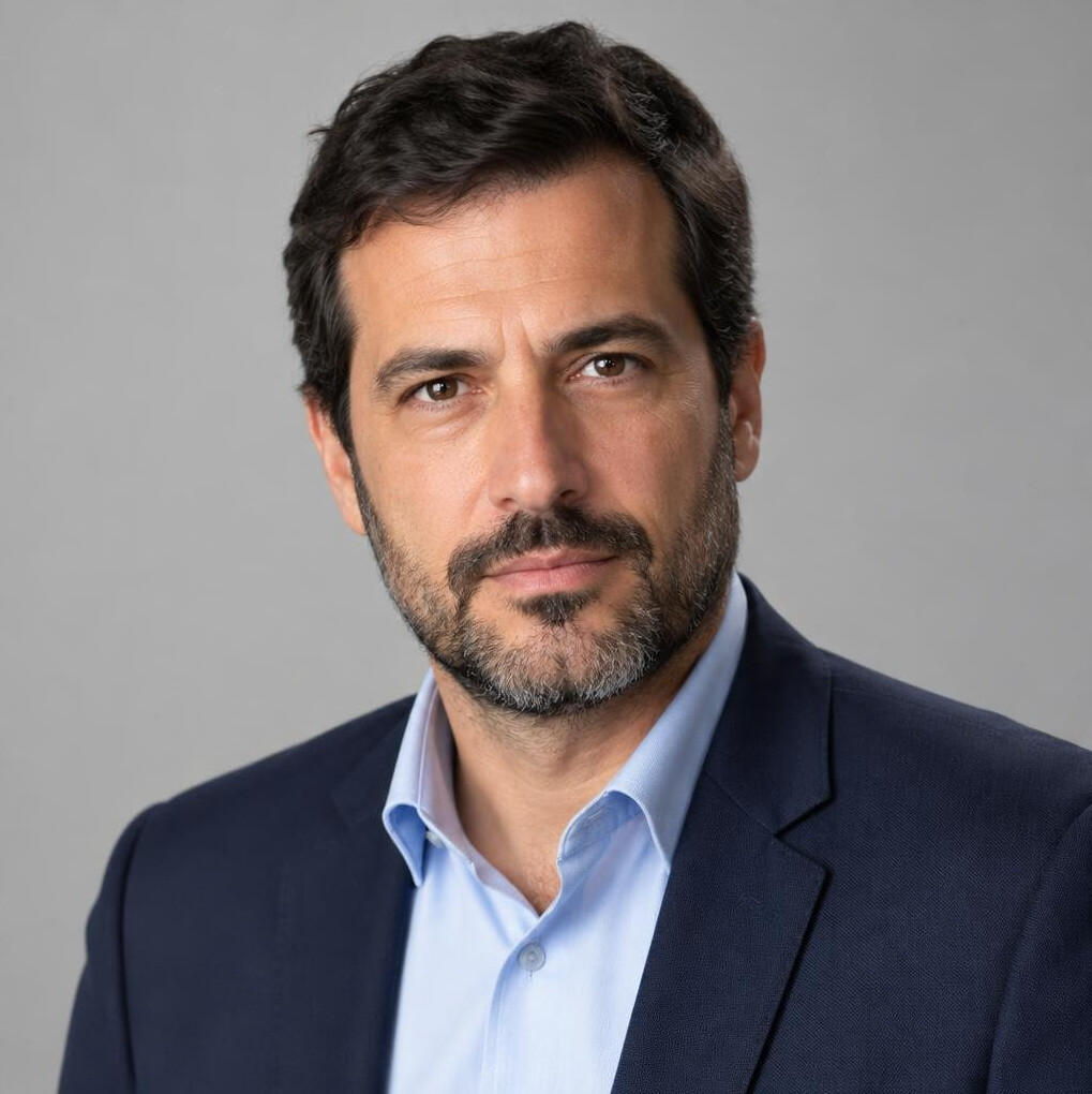 Studio portrait of a Portuguese man investigative reporter in his 40s